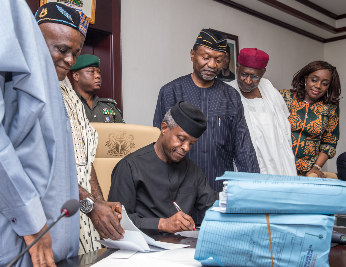Ag President Osinbajo Signs 2017 Budget Into Law On 12/06/2017